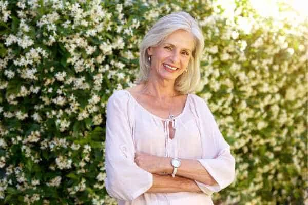 Older woman happy with urinary incontinence treatment Eastbourne